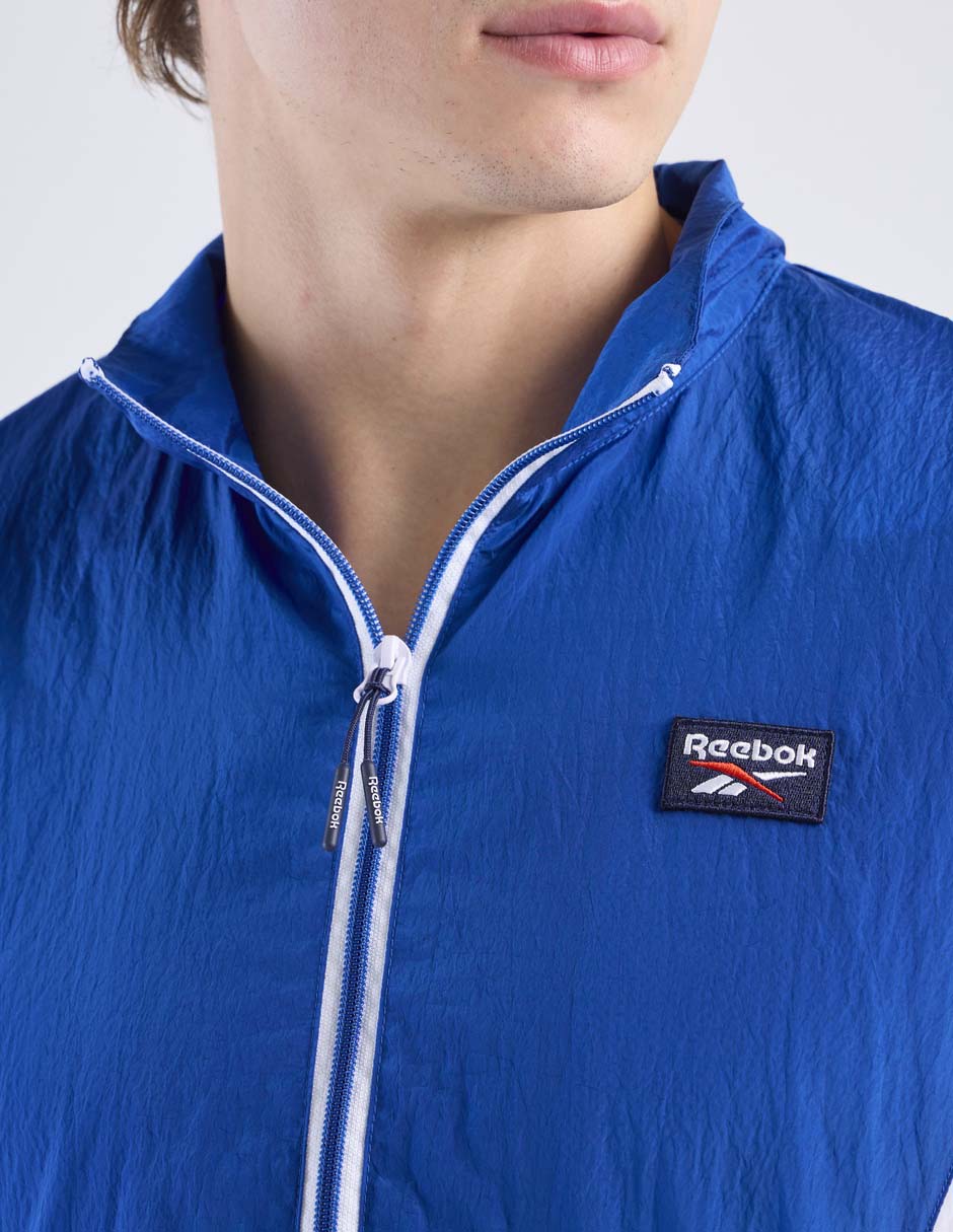 Chamarra rompevientos reebok con bolsillos para hombre