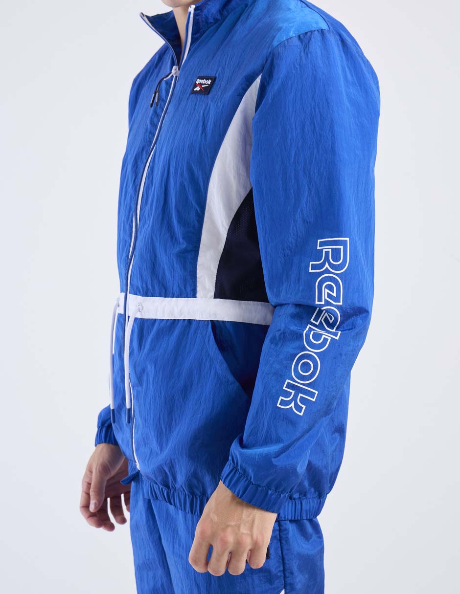 Chamarra rompevientos reebok con bolsillos para hombre
